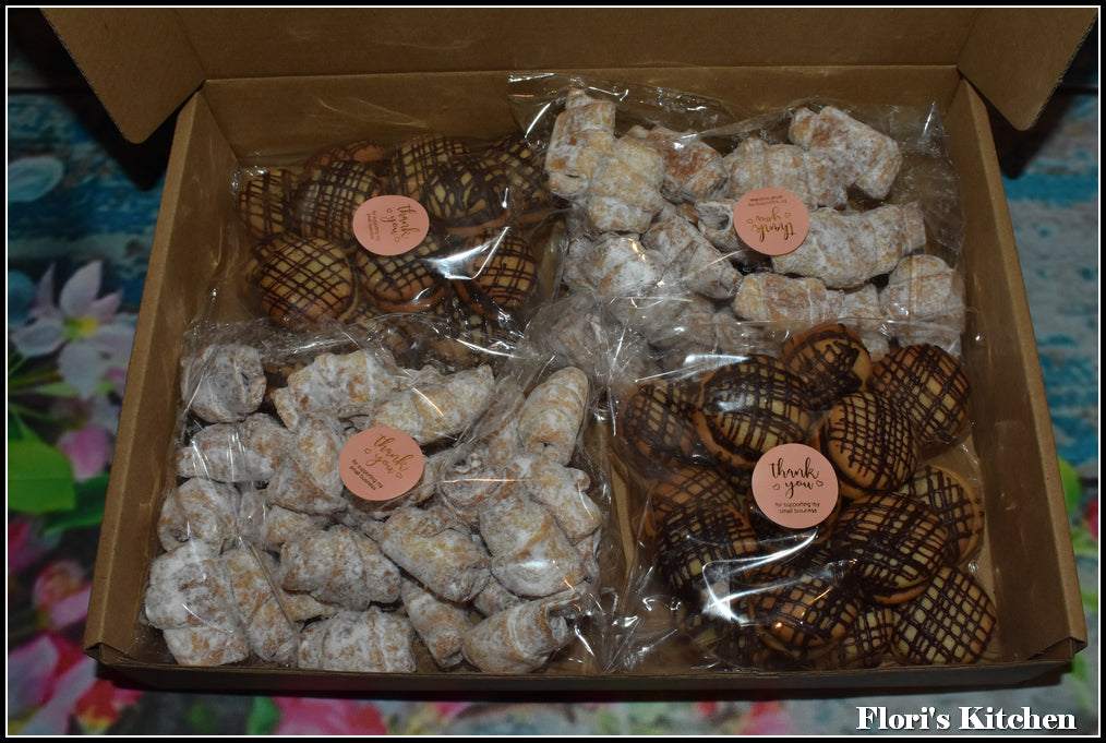 Mixed box with Rugelach Cookies and Chocolate Sandwich Cookies.